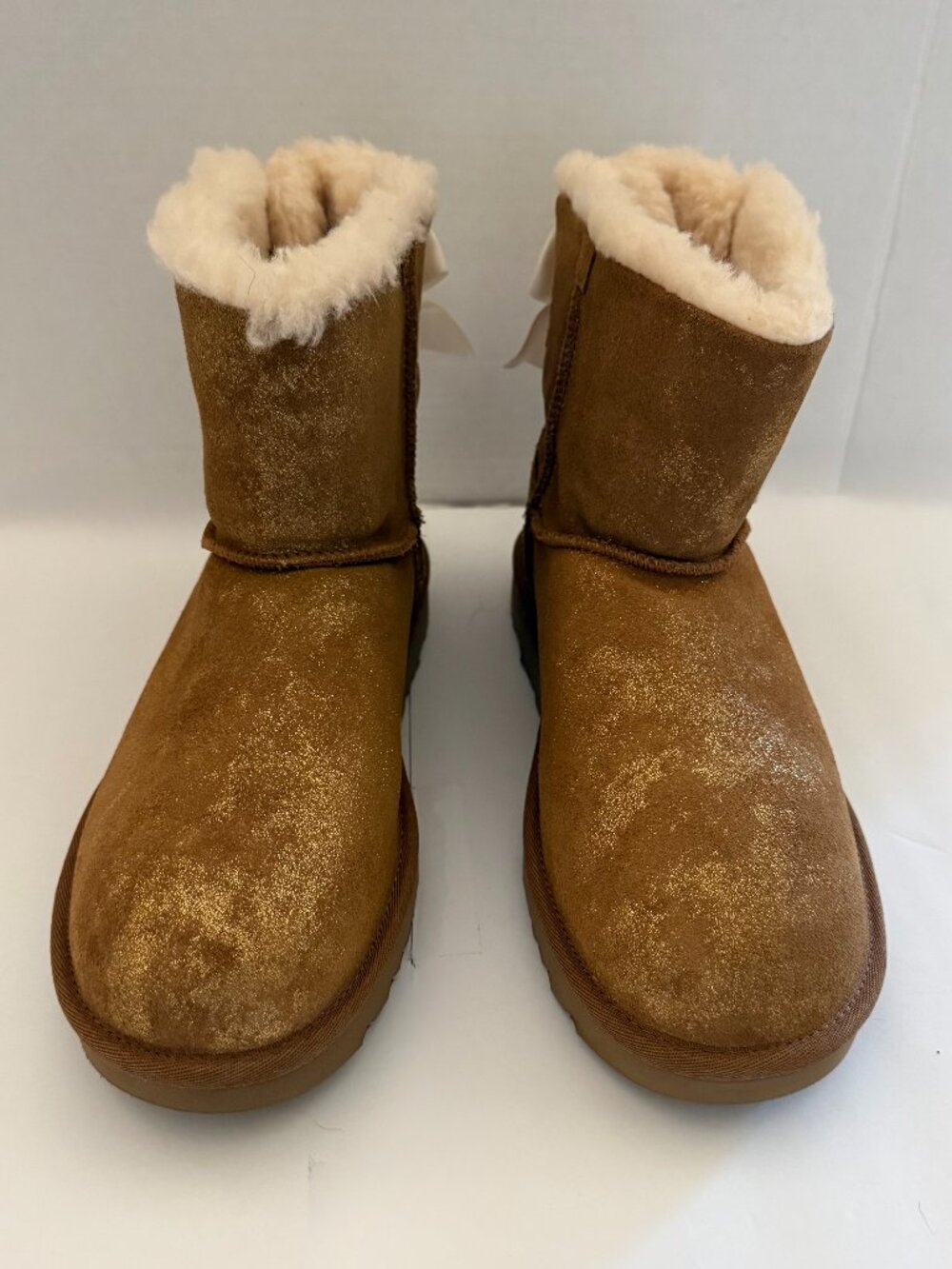 UGG Mini Bailey Glimmer Bow Booties